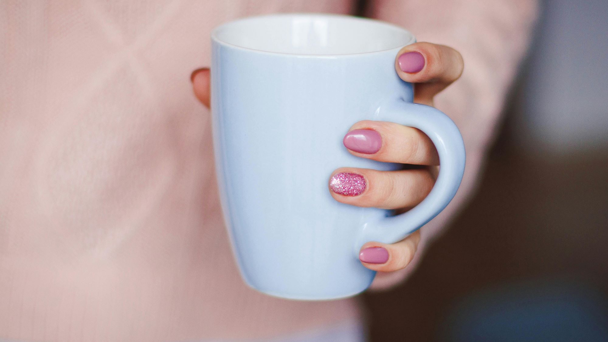Woman holding a coffee mug